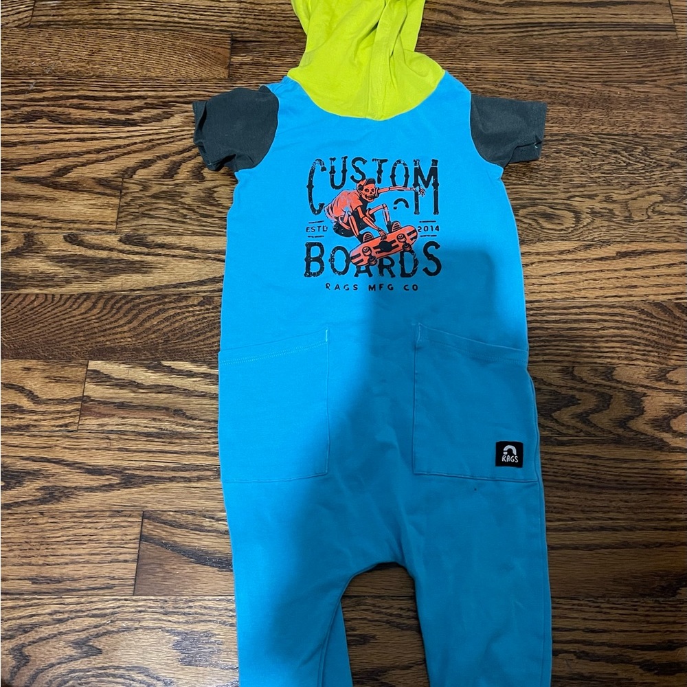 Rags to raches skateboard onesie